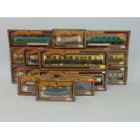 Collection of 12 boxed Mainline coaches and wagons including 8 coaches in chocolate/ creamlivery,