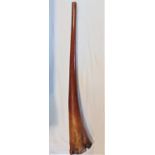 A single root carved didgeridoo 144 cm long