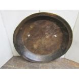 A primitive turned wood antique dairy bowl, 64cm diameter