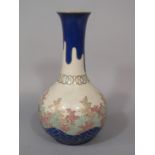 A late 19th century Satsuma vase with drawn neck with painted and gilded leaf decoration and