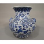 A 19th century oriental vase with blue and white painted dragon and flaming pearl detail and moulded