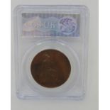 1858 penny in graded capsule