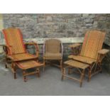 Two vintage French cane work reclining chairs with adjustable backs and stow away foot rests, both
