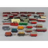 Quantity of Hornby Dublo wagons including 3 breakdown packing vans, a Midland Rail horsebox, and a