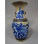 A 19th century oriental vase with crackle glaze detail, blue and white painted pheasant a