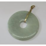 9ct mounted hardstone bi-disc pendant, possibly jade, 5.3cm diameter approx