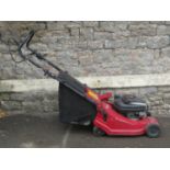 A Suffolk Punch rotary petrol 16R lawn mower and grass collection box/bag (privately entered,