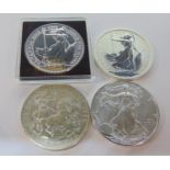 2013 1oz silver Britannia coin, 2011 1oz silver US Eagle coin, 1999 1oz silver Britannia coin and