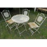 A weathered contemporary light steel four piece garden terrace set comprising circular top table and