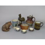 A interesting collection of mainly 19th century ceramics including a green glazed earthenware