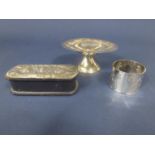 A mixed collection of silver to include an eastern white metal tazza, the rim embossed with
