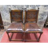 Six (4+2) oak frame dining chairs, in the Old English manner, with turned supports, hide upholstered