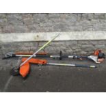 A Stihl KM85R petrol engine/combi garden tool with hedge trimmer attachment, circular blade and