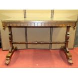 An early Victorian rosewood centre table of rectangular form, raised on a stretcher base with