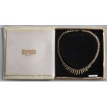 9ct Cleopatra style fringe necklace with textured finish, cased, 12.5g