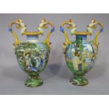 A pair of large and good quality Italian Maiolica two handled vases by Ginori, both with all over