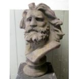 A composition stone bust of a bearded gentleman with flowing hair and well defined features,