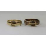 Two 9ct buckle rings, sizes U & T, 8g total (2)