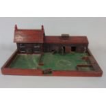Hand built folk art style model of a house and farm yard with stables, pig pen and dove cote, 62 x