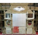 An Edwardian overmantel mirror, the gilt frame with applied acanthus and further mouldings, open