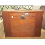 A vintage portable engineers tool chest with removable drop front revealing a fitted interior of