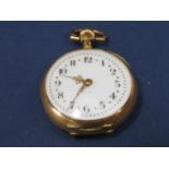 Good quality French 18ct fob watch, the back with tri-colour relief of floral swags, inset with a