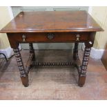 A good quality oak side table in the 17th century manner, the plank top with moulded outline over
