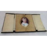 Late 19th century British school - Bust length miniature portrait of a brown eyed child wearing a