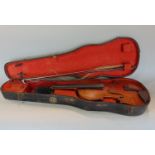 19th century continental unlabelled violin, with case and two bows, the violin 60cm long