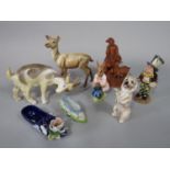 A Beswick model of a Doe, a Royal Doulton Bunnykins figure 'Dollie Bunnykins - Playtime' DB8, a