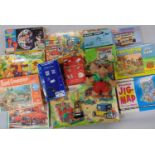 Large collection of vintage games and puzzles together with a boxed model Tardis and a part