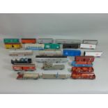 Collection of unboxed Rivarossi wagons, boxcars etc together with a repainted Santa Fe locomotive