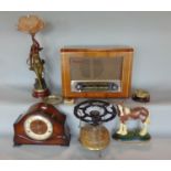 A brass and enamel primus stove with train mantle, a Pye valve radio, a door stop in the form of a