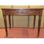 A good quality 19th century mahogany side table, with single piece top, over two frieze drawers with