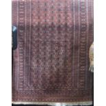 Good quality Bokhara type full pile rug with unusual repeating geometric medallion decoration upon a