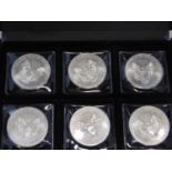 Six 1oz silver eagle coins