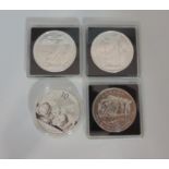 2 x 1oz silver Britannia coins, 2013 1oz silver Canadian wood bison coin and a 1oz silver panda coin