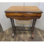 A mid-19th century rosewood ladies sewing table, the rising lid enclosing a mirror with birds eye