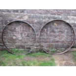 A pair of weathered G W R wheel rims, 96 cm in diameter