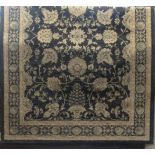 Indian type rug with scrolled decoration upon a black ground, 200 x 140cm