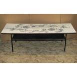 A low mid-20th century occasional table of rectangular form, with white melamine and maple leaf