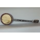 An antique banjo frame, with ebony and mother of pearl fret board, with a Dulcet trademark stamp