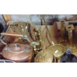 A collection of miscellaneous brass and copper wares to include an oval copper kettle, two brass