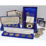 A collection of ERII crowns, bronze pennies, Ashley enamel silhouette
