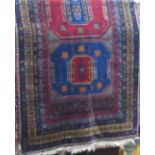 Good quality Persian three medallion runner/carpet with intricate decoration upon a blue ground, 300