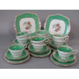 A collection of Paragon China green ground tea wares with printed pheasant and floral detail