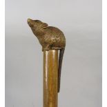 19th century parasol, the handle carved with a rodent with glass eyes