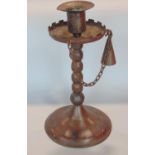 Goberg German wrought iron candlestick with turreted drip tray and bobbin column, with snuffer on