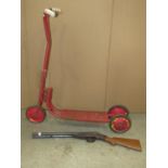 A Ke-lo vintage child's scooter, together with a Jefe toy twin barrel shotgun