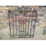 An iron pedestrian gate with scrolled detail, 86cm wide